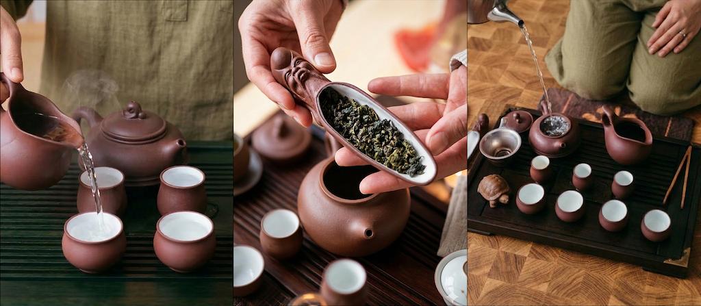 Warm water is poured from a fairness pitcher into small tasting cups to warm them, then loose tea leaves are placed into a gaiwan or Yixing teapot using a scoop and funnel, after which hot water is poured into the pot from above until it slightly overflows.